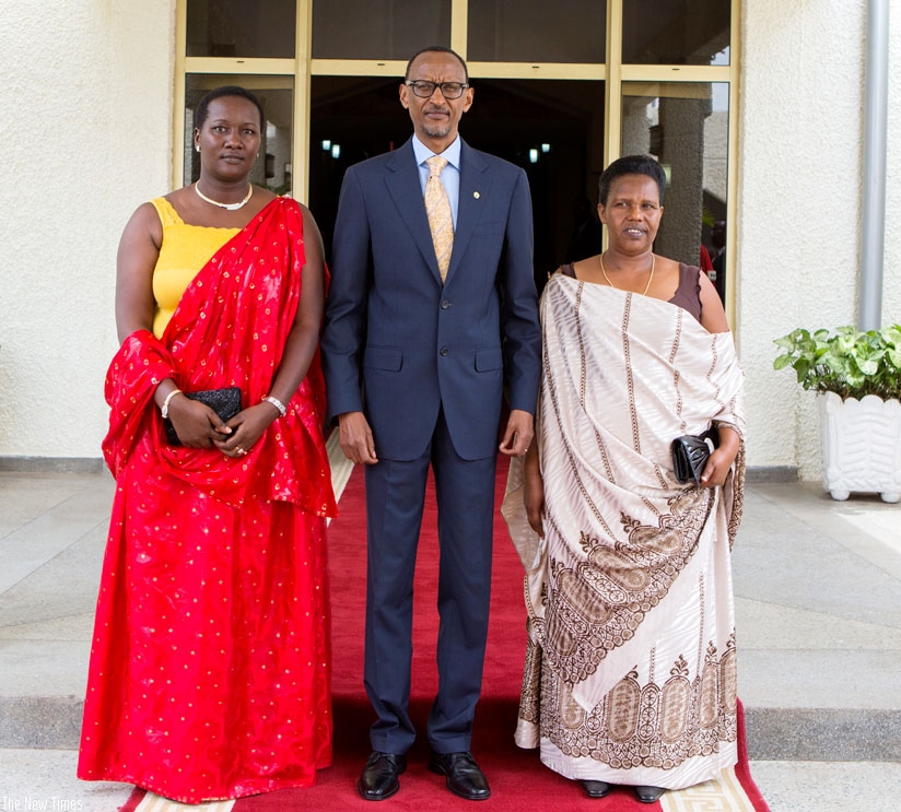 President Kagame, Minister Uwacu (L) and MP Mukandamage at Parliament Buildings after the two officials were sworn in yesterday. (Village Urugwiro)