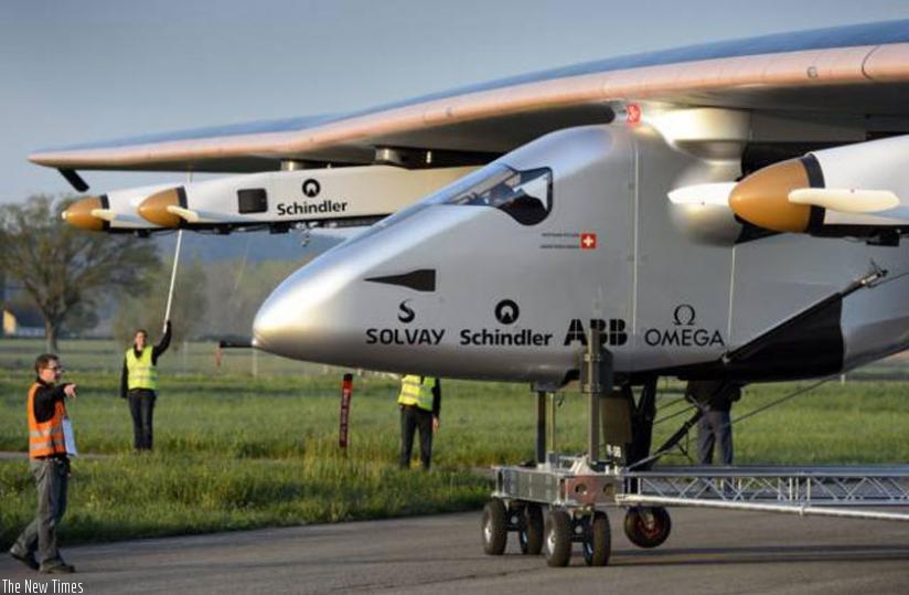 People stand around the new experimental aircraft u201cSolar Impulse 2. The aircraft yesterday started its main major journey across the world. (File)