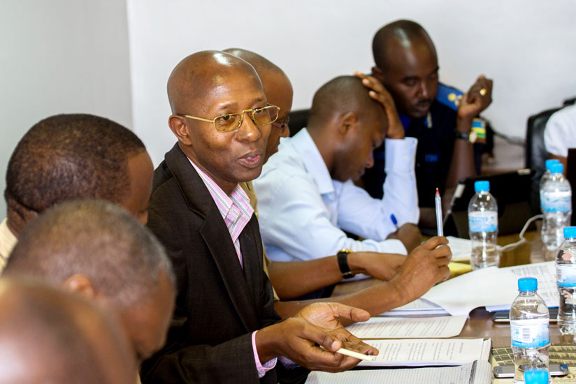 The Minister for Internal Security, Sheikh Fazil Harerimana (C), responds to queries from MPs yesterday.  He said Nyarugenge rnCentral Prison under construction will be ready next year. (Timothy Kisambira)