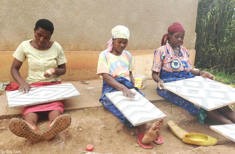 Women make Imigongo ornaments. Amelie Ntigulirwa says women should use their own inherent skills and capabilities to accomplish any given task, in any given field of work. (Courtesy)