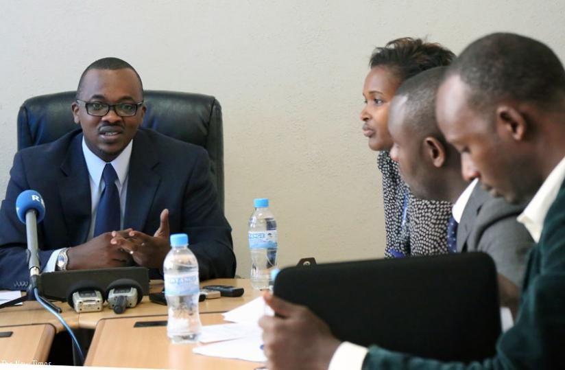 Bulindi (L) addresses journalists in Kigali yesterday. (John Mbanda)