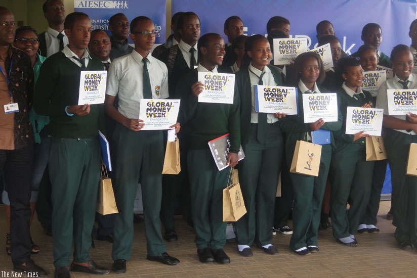 Green Hills Academy students display the certificates of attendance after a one-day training in financial literacy at I$M Bank. (Solomon Asaba)