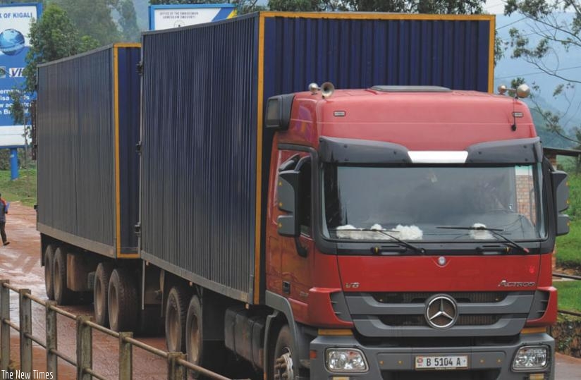A cargo truck enters Rwanda at Gatuna on the Uganda/Rwanda border in Gicumbi District. A law allowing importation of right hand drive trucks and buses was gazetted on Feb 26. (File)