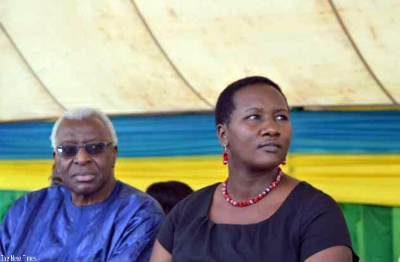 Diack Lamina (left) with Sports Minister Julienne Uwacu during the launch of a Children Athletics proramme at Nyarugugu primary school. (File)