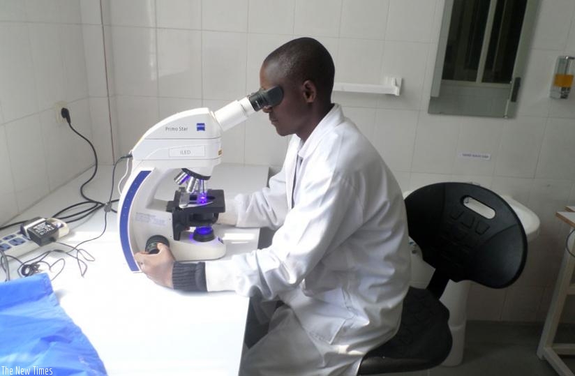  A lab technician screens for MDR TB at Gicumbi hospital, Nothern Province recently. (Ivan Ngoboka)