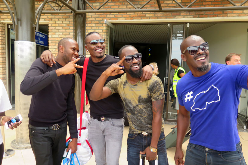 Frankie takes a selfie with Tayo and his entourage.