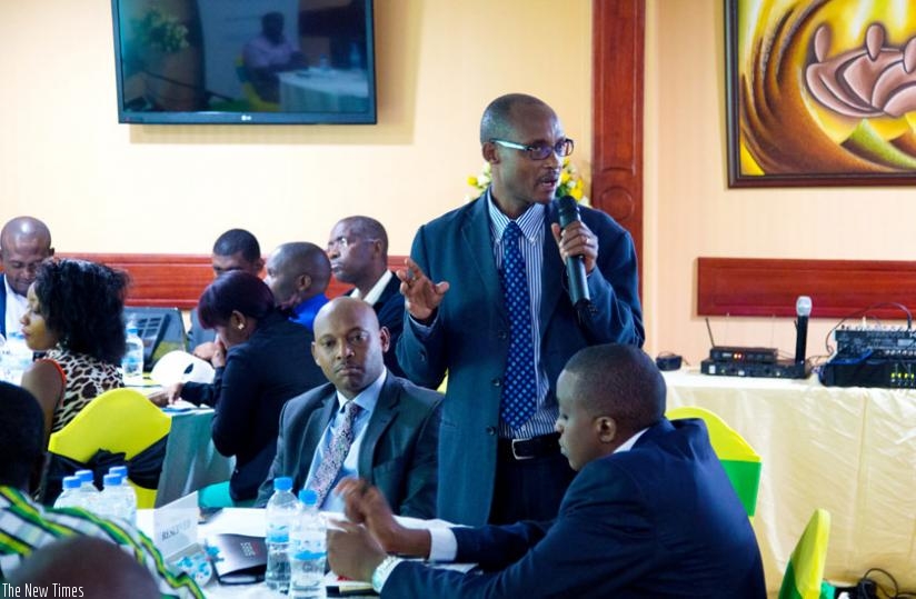 Bagabe speaks during the meeting in Kigali yesterday. (Timothy Kisambira)