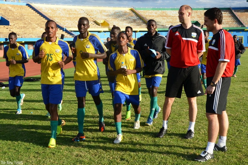Amavubi head coach Johnny McKinstry (extreme right) oversees his team through their final preparations ahead of the Zambia friendly which Rwanda lost 2-0 on Sunday. (S. Ngendahimana)