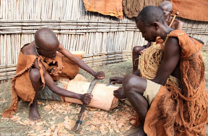 Culture enthusiasts illustrate how to make back cloth at Nyanza Museum last year. (Timothy Kisambira)
