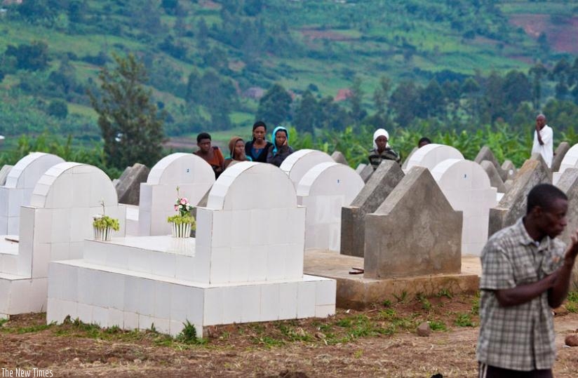 Mourners during a funeral at Rusororo public cemetery last year. (Timothy Kisambira)
