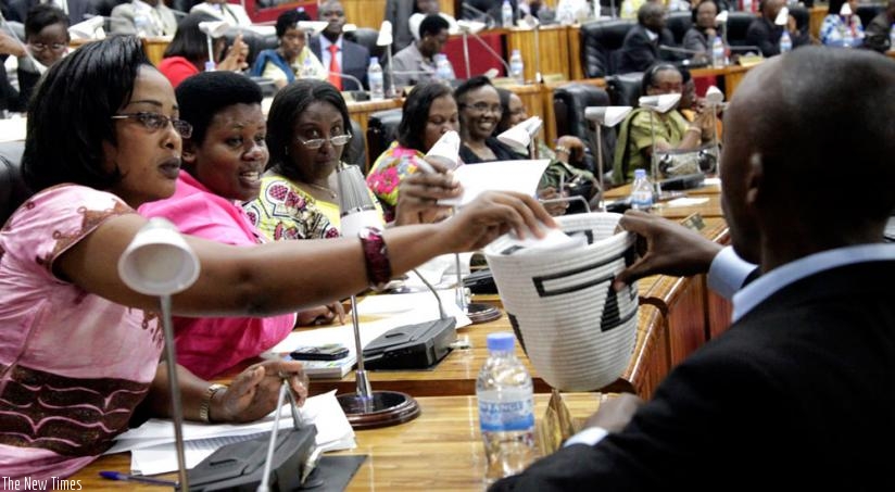 Parliamentarians in a voting exercise during a previous session. The legislators have formed an association to fight against Genocide denial and ideology. (File)
