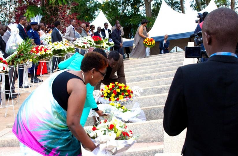 Relatives of the victims of the 1994 Genocide against the Tutsi lay wreaths at Rebero memorial last year.  Police have called on the public to fight genocide ideology. (File)