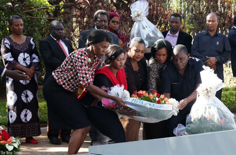 Tanzanian MPs lay a wreath on one of the mass graves at Kigali Genocide Memorial yesterday. (John Mbanda)