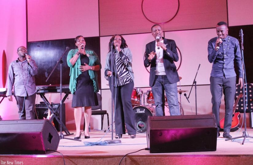 Singers (L-R), Patrick Nyamitali, Aline Gahongayire, Tonzi, Intore Masamba and Jules Sentore take to the stage for a joint performance. 