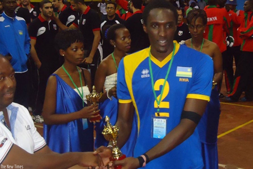 Christophe Mukunzi receives an award for best player at a previous tournament. (File)rn