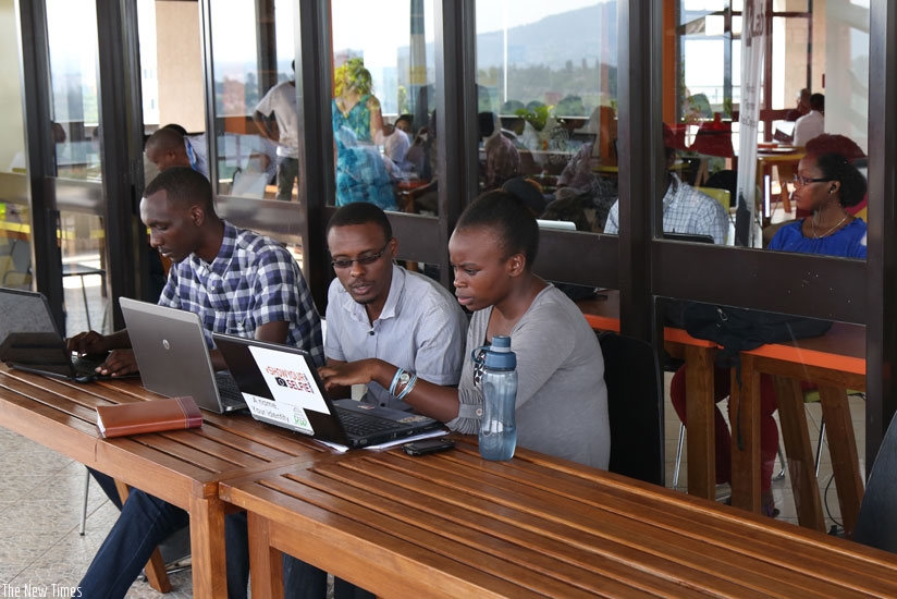 Young entrepreneurs at K-Lab, a start-up hub, in Kigali. (File)