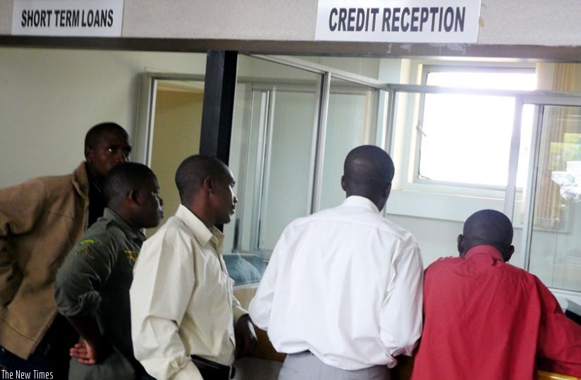 Clients seek financial services from a bank in Kigali. (File)