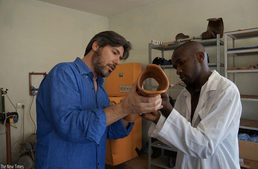 Professor Matt Ratto and Jenan Taremwa, a CoRSU orthopaedic technologist, examine a welded joint on a socket 3D printed in multiple parts. (Forbes)