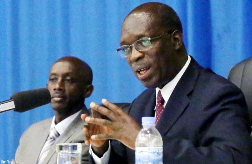 Premier Murekezispeaks as Local Government minister Francis Kaboneka looks on during the meeting with central and local government officials yesterday.(John Mbanda)