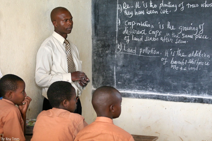 A teacher conducts a lesson recently. (File)