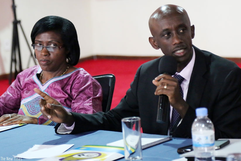 Local Government minister Kaboneka (R) and Deputy Ombudsman Bernadette Kanzayire during the news briefing yesterday. (John Mbanda)