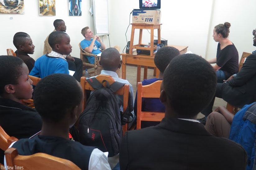 Learners listen to a counterpart from German via video link last week. Rwandan students also had an opportunity to share their views. (Solomon Asaba)