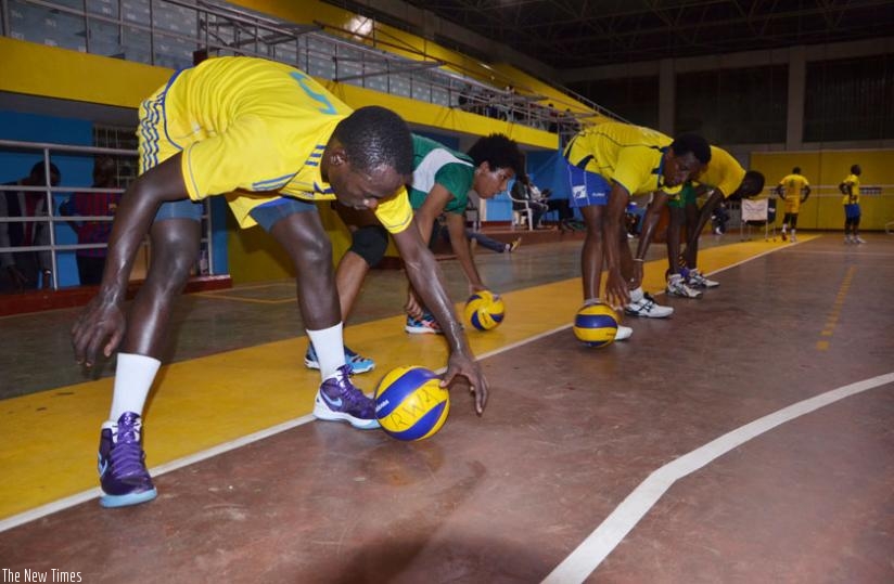 The national volleyball team trains at Amahoro indoor stadium recently. The team plays the first of its three friendlies today. (Sam Ngendahimana)