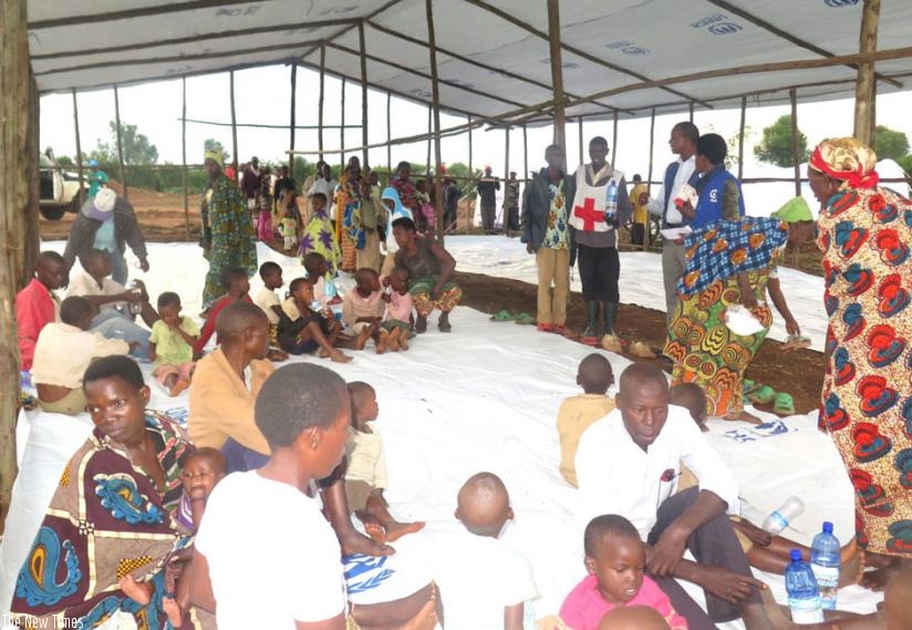 Refugees in Mahama sector wait for accomodation on Wednesday. (Stephen Rwembeho)