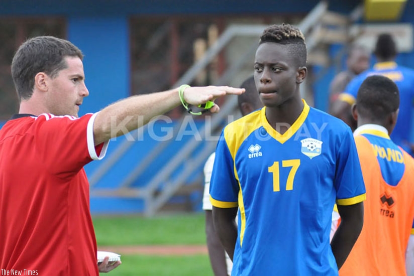 Yves Rubasha listens to instructions from U23 team coach Johnny McKinstry during a training session on Wednesday. (Courtesy)