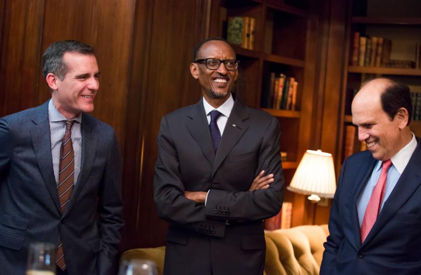 President Kagame with Michael Milken, the founder of the Milken Institute (left) and Mayor Eric Garcetti of Los Angeles (right) during the welcome reception of the Milken Institute Global Conference. (Village Urugwiro)
