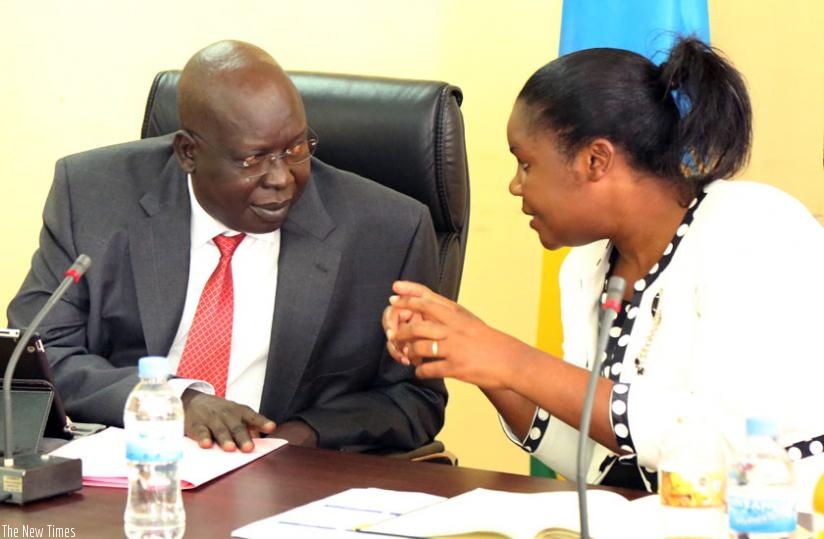 Public Service minister Judith Uwizeye (R) chats with her South Sudanese counterpart Ngor during their meeting yesterday. (John Mbanda)
