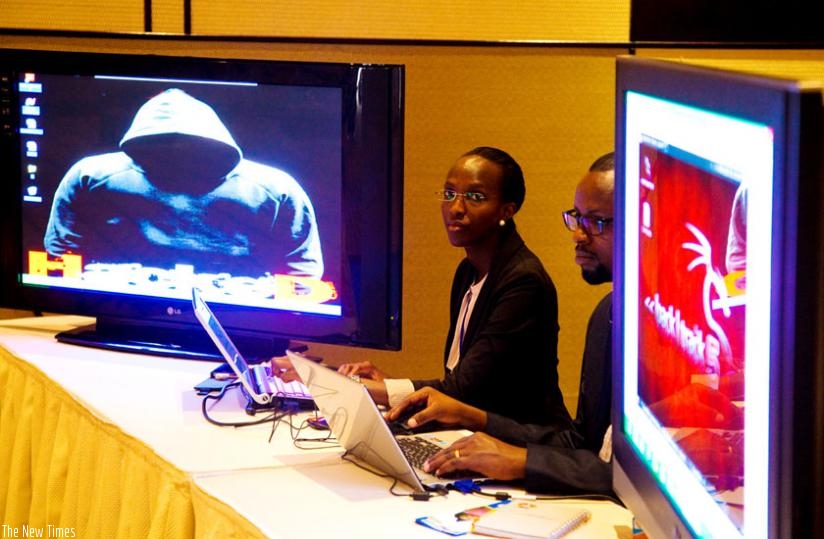 Paula Saphir Helene, the senior network security engineer at RDB, demonstrates how a computer is hacked during a cyber conferece in 2013. (File)