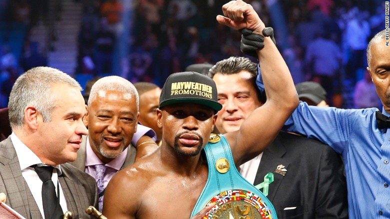 Floyd Mayweather Jr. celebrates victory after the MGM clash. (Internet photo)