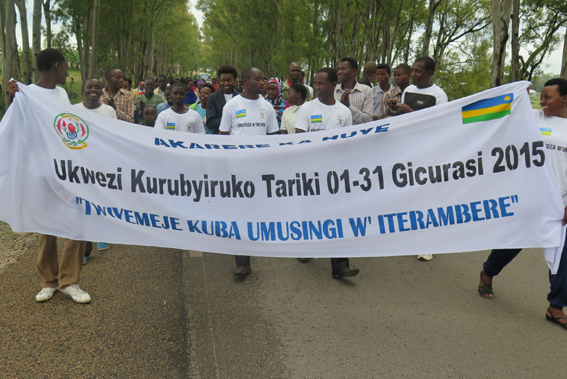 Youth march during the launch of the YouthConnekt in Kinazi Sector, Huye District on Saturday. (Emmanuel Ntirenganya)