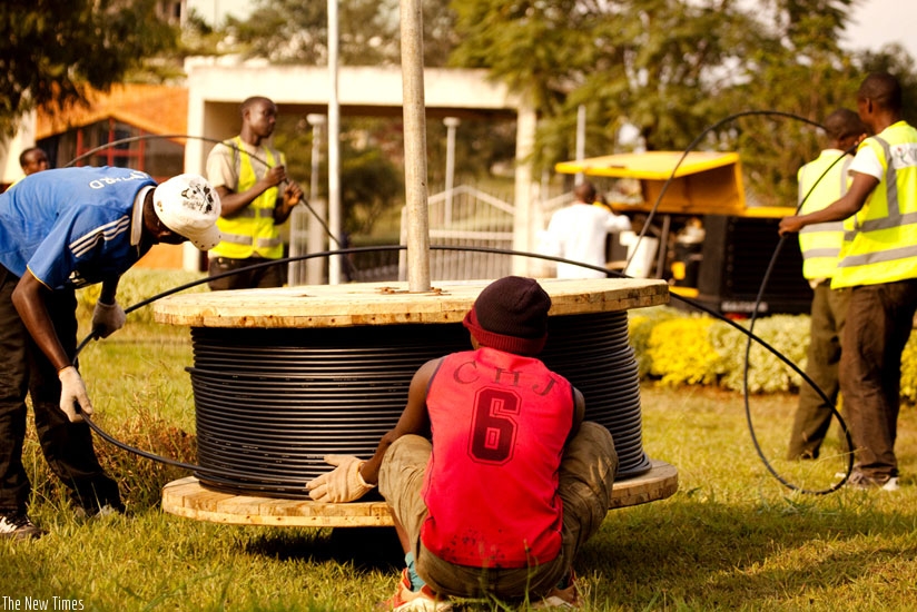 Telecom workers install fibre optic cables in Kimihurura last year. (File)