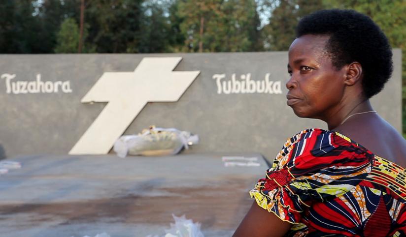 A sombre Philomene Kankesha commemorates the victims of the 1994 Genocide against the Tutsi at the Karembure Genocide Memorial, Kicukiro. (Faustin Niyigena)