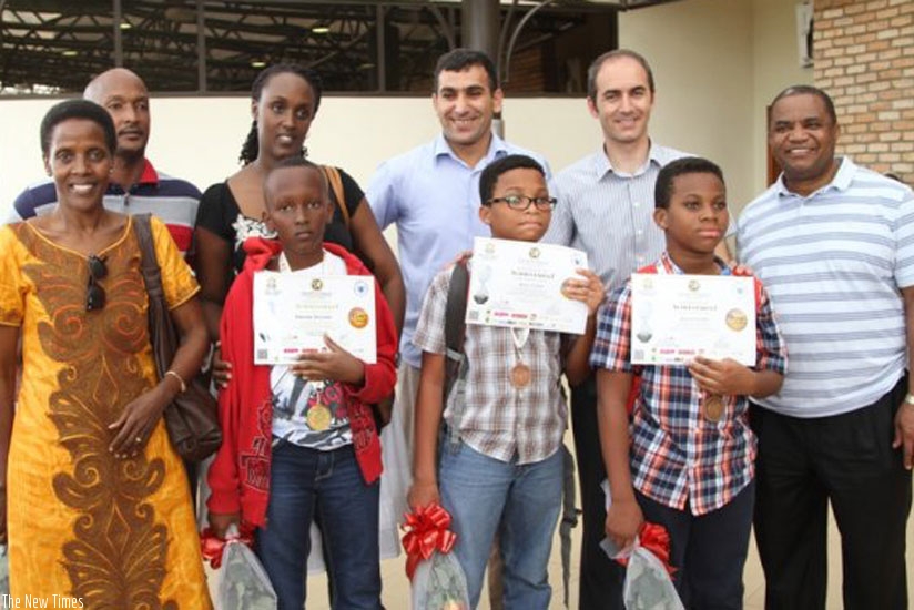 Winners (front row) show off their certificates. (Courtesy)