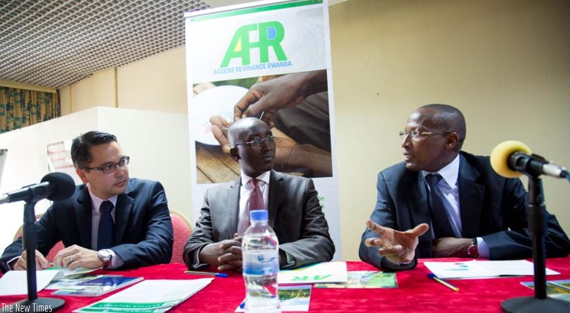 L-R: Sidney Augustin, the DFID Economic Adviser; Jean Bosco Iyacu of AFR; and Kevin Kavugizo, the Director Microfinance Supervision BNR, during the launch of the FIN scope study at Umubano Hotel yesterday. (Doreen Umutesi) 