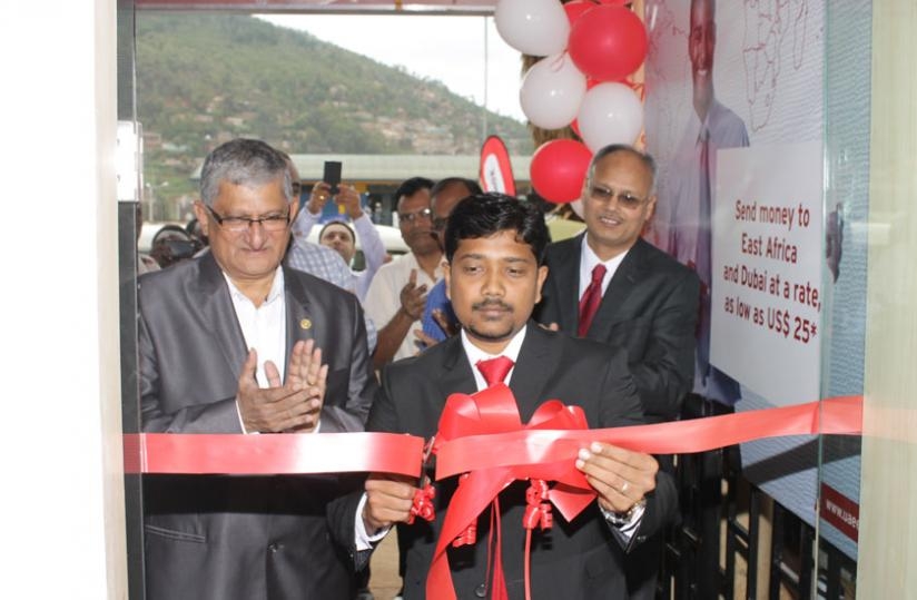 Riyaz Naghoor, the firm's Head of operations cutting the ribbon.The new branch is expected to bring on board efficiency. (Courtesy)