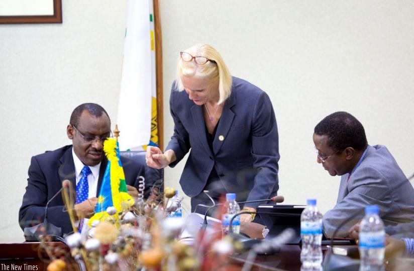 Finance and Economic Planning minister Claver Gatete (L) Leoni Cuelenaere, the Dutch ambassador to Rwanda, and the Minister for Natural Resources, Dr Vincent Biruta, during the signing of the funding deal in Kigali yesterday. (Timothy Kisambira)