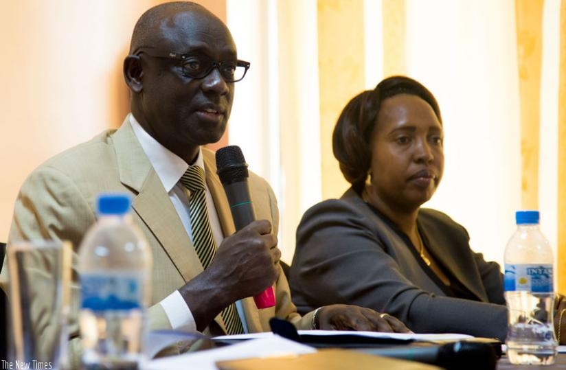 Busingye (L) and Odette Yankulije (R), Head of Access to Justice Department, at the meeting in Kigali yesterday. (Doreen Umutesi)