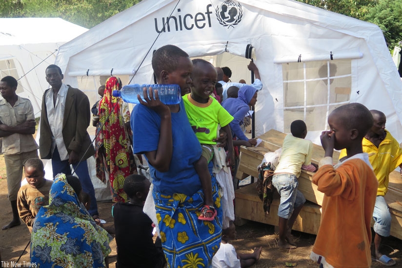 Some of the Burundian refugees at Muyira Refugee Transit Centre in Nyanza District before they were transferred to Mahama camp in Kirehe District. (File)