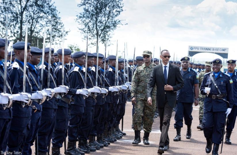 President Kagame inspects a parade of Police Cadet Officers at their pass-out ceremony at Police Training School in Gishari, Rwamagana District yesterday.(Village Urugwiro)