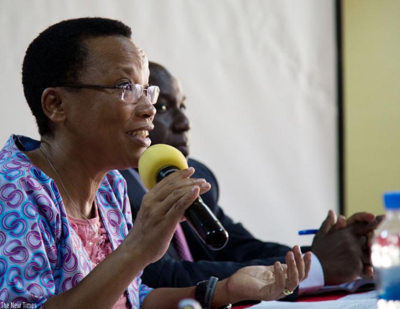 Dr Mukankomeje gives her remarks as RAMCEA's Mafabi looks on. (Timothy Kisambira)