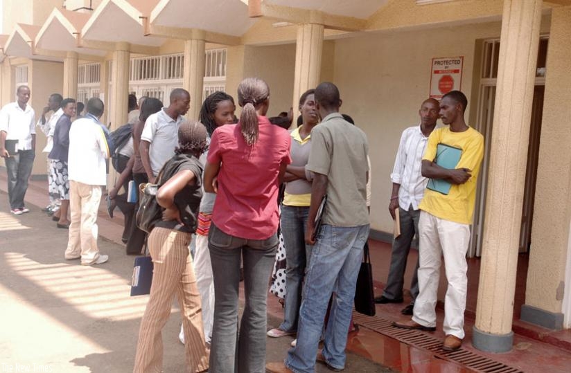 Students supported by FARG outside the Fund offices in Remera, Kigali. (File)