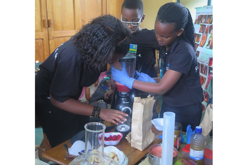 Pupils of Green HIlls Academy doing a practical during the Science Fair last week.  (Solomon Asaba)