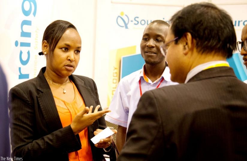 Mbabazi interacts with some of the exhibitors of BPO at the expo yesterday. (Doreen Umutesi)