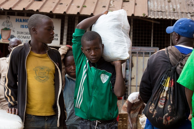 Hassan Ishimwe dreams of going back to school and becoming a journalist. (Timothy Kisambira)