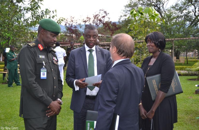 General Kabarebe chats with ambassador Shoham, Dr Anita Kiamba and Brig Gen Charles Karamba after the closure of the symposium. (Jean d'Amour Mbonyinshuti)