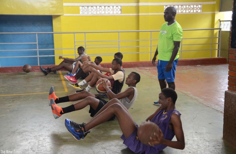 The U-16 boys team training at Amahoro stadium recently. Only Eritrea stand in their way to lift the 2015 Afro-Basketball tourney. (Sam Ngendahimana)